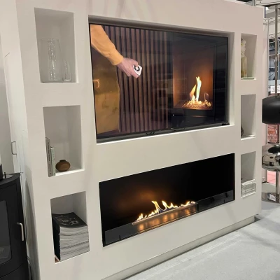 Foco One 1500 media wall built-in bio fireplace with black frame and safety glass.