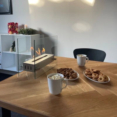 Tabletop bio fireplace with glass and 0.7 liter burner Small tabletop bio fireplace of steel and glass