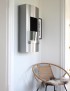 Uniquely designed bio ethanol wall fireplace with a glass window panel
