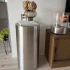 ScandiFlames Dualis bioethanol fireplace with a brushed steel fireplace body and a cylindrical safety glass