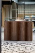 Foco Four 800 built-in bioethanol fireplace with black steel frame, tempered glass panels, and a vibrant flame display