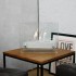 Small tabletop bio fireplace of steel and glass